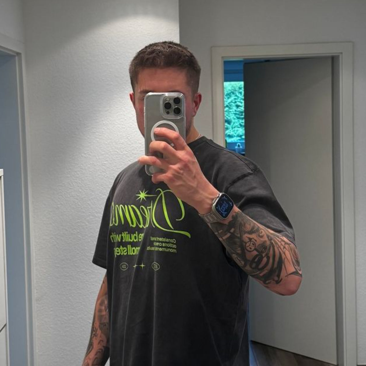 Träume werden mit kleinen Schritten gebaut Oversized T-Shirt